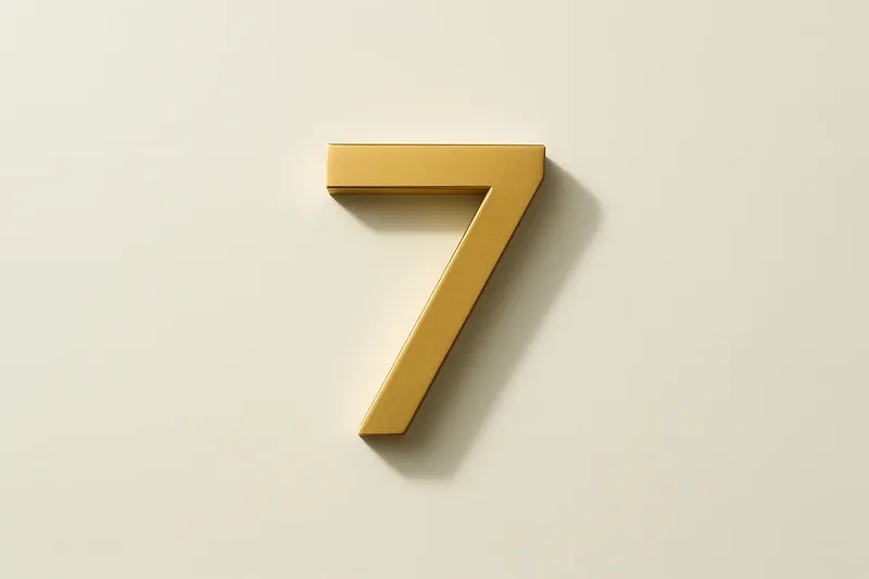 Single large golden seven symbol on cream background with soft shadow